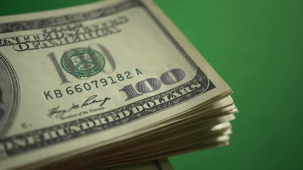 Counting 100 Dollars Isolated On Chroma Key Green Screen Background ...