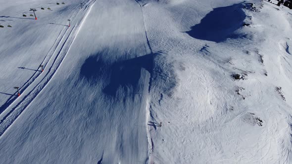 Snowy Mountain Hut in Tirol Region in Austrian Alps Hochfugen Drone Flyover the Mountains and