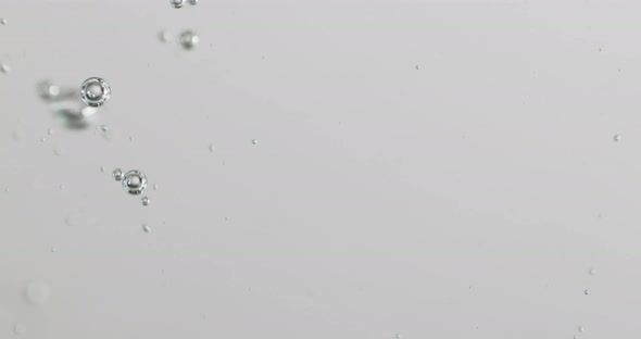 Bubbles Falling And Rising In Water alt