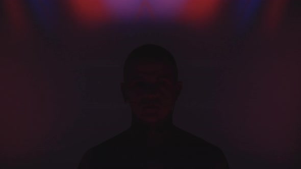 Creative Portrait of Tattooed Man with Nose Chain alt