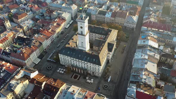 Aerial Drone Video of Lviv Old City Center - Roofs and Streets, City Hall Ratusha alt