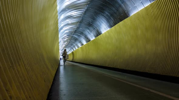 People in underground walkway tunnel Time Lapse