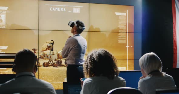 Mars Mission Leader Using VR Headset alt