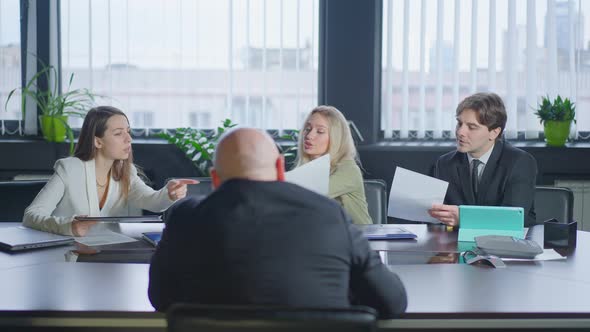 Group of People Discussing Business Project Idea Sitting in Office As Man Entering alt