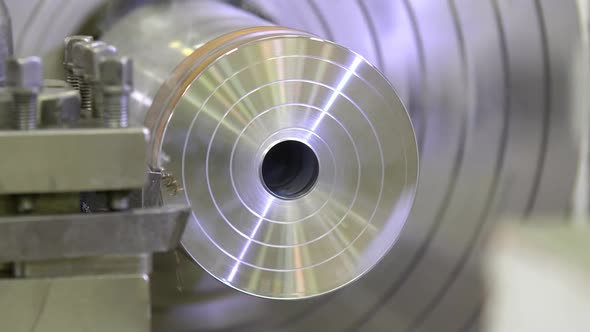 The Operation of Lathe Machine Cutting the Metal Shaft Parts alt