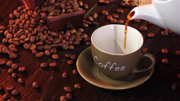 Espresso in Small Cup on a Saucer on Wooden Table alt