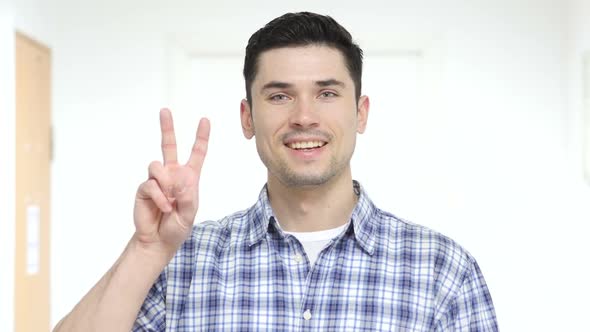 Victory Sign By Young Man alt