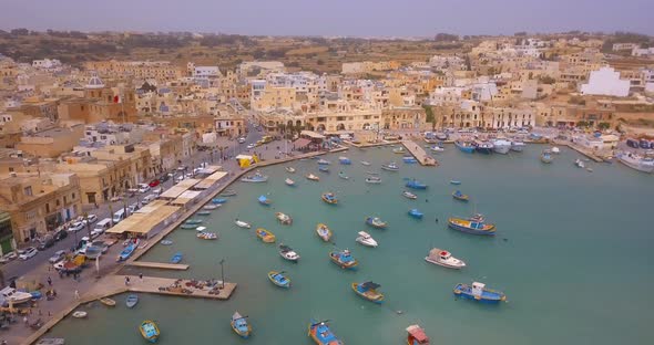 Mediterranean traditional colorful boats luzzu alt