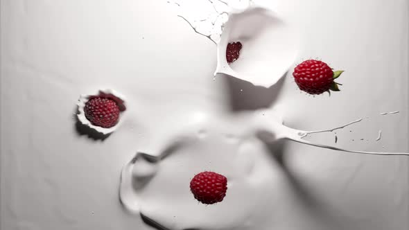 Raspberries Falling into Yogurt 4k