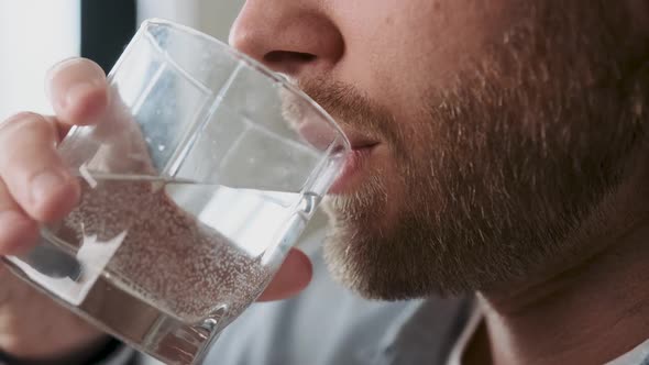 Close Up Cropped Man Holding Glass Drinking Still Water Health Care Healthy Lifestyle Concept alt