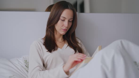 Female Reading Book in Morning alt