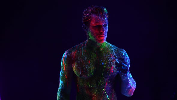 Nude Man with Colorful Neon Body Art