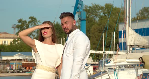 Couple Standing in Port in Summer