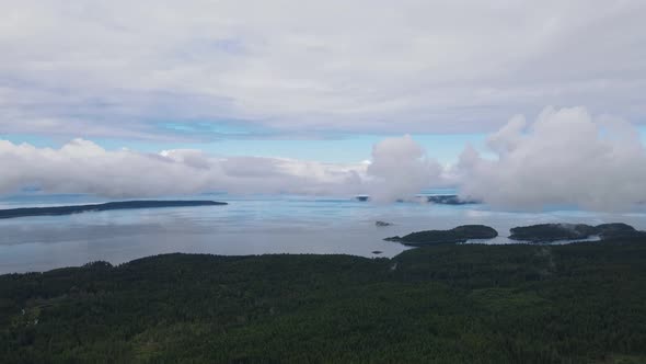 Vast, open landscapes of the Sunshine Coast in British Columbia, Canada. Wide angle aerial panning s alt