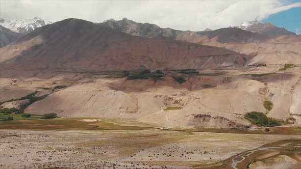 View of the Pamir, Afghanistan and Panj River Along the Wakhan Corridor. alt