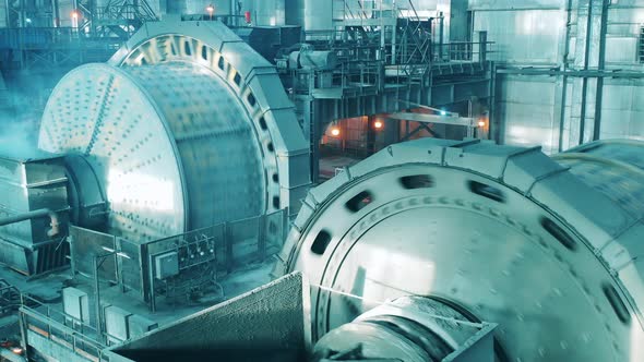 Grinding Mills on the Premises of a Mining Factory alt