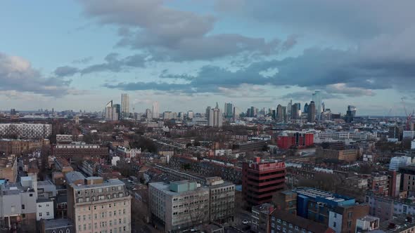 Slider drone shot of London skyscrapers from Camden alt