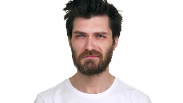 Young Man Sad Burst Into Tears on White Background alt