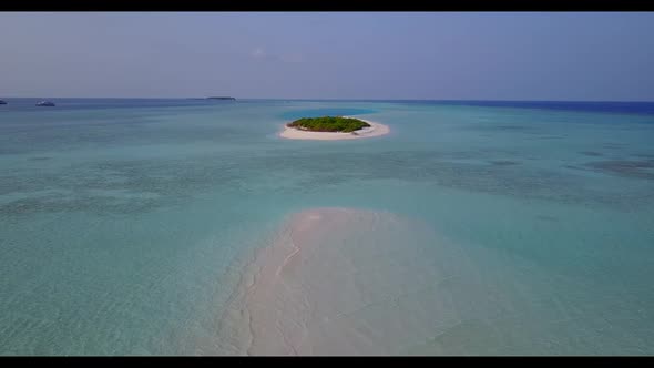 Aerial travel of tranquil tourist beach trip by blue water and white sand background of journey near alt