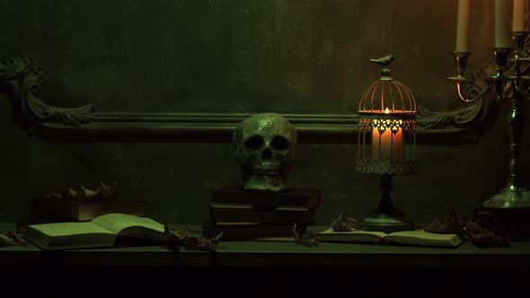 Mystical Halloween still-life background. Skull, candlestick with candles, old fireplace. alt