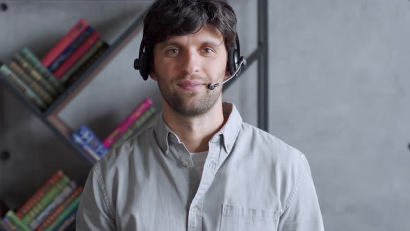 Telemarketer Operator Representative Speaking To Web Camera. Businessman Wears Headset Video alt