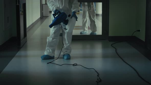 Video of routine disinfection of building corridor. Shot with RED helium camera in 8K.  alt
