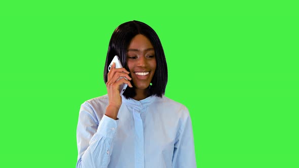 Cheerful Black Female Communicating with Business Boss or Parent on Smartphone Girl on Mobile Call