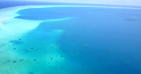 Tropical aerial clean view of a sunshine white sandy paradise beach and turquoise sea background in  alt