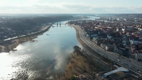 AERIAL: Nemunas River with European Capital of Culture 2022 Kaunas City Panorama alt