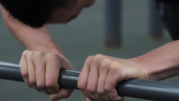 Man training outdoors on sports field