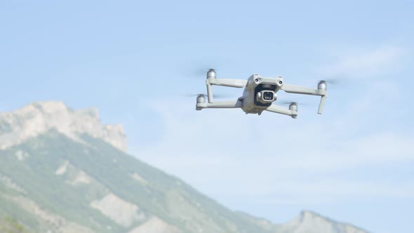 Drone filming video of natural landscape alt