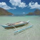 Lonely Fishing Boat in Slowmo Floating in Open Blue Lagoon of El Nido Bay, Palawan, Philippines - VideoHive Item for Sale