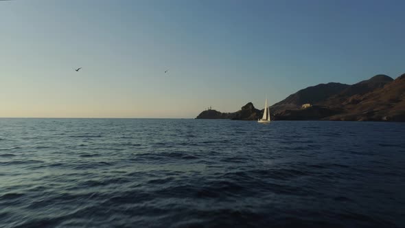 Sailboat Floating over the Atlantic Ocean in the Western Part of Spain alt