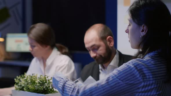 Selective Focus of Businesswoman Discussing Financial Graphs Analyzing Company Statistics alt