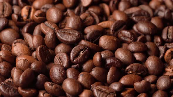 Aromatic Coffee Beans Lie Before Coffee Preparation, Coffee Beans Rotate