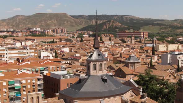 Beautiful rooftops cityscape of Madrid, aerial drone orbit view alt