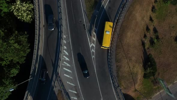 Car Driving on Road Junction. Top View From Drone Car Motion on Highway Junction alt