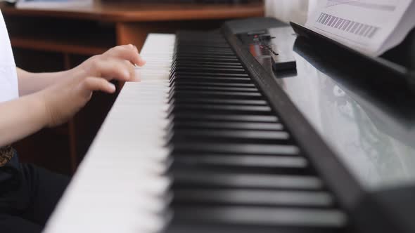 Electronic Piano. Fingers Press the Piano Keys. Music Lesson. Fingers Press the Keys of a Musical alt