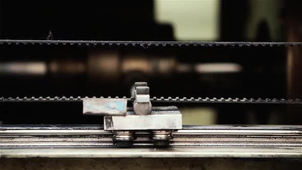 Old Rusty Pulley in a Machine. alt