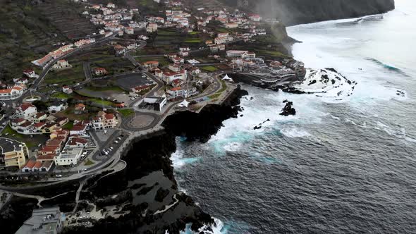 Aerial Forward Unveil Shot of Porto Moniz Town, Madeira Island, Portugal