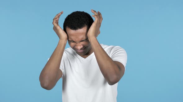 Young African Man with Headache alt