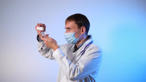 Doctor Medical Mask Pouring Pills From Bottle alt