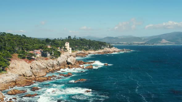 Cinematic  Aerial of California Coast with Blue Sky Above Pacific Ocean, USA alt