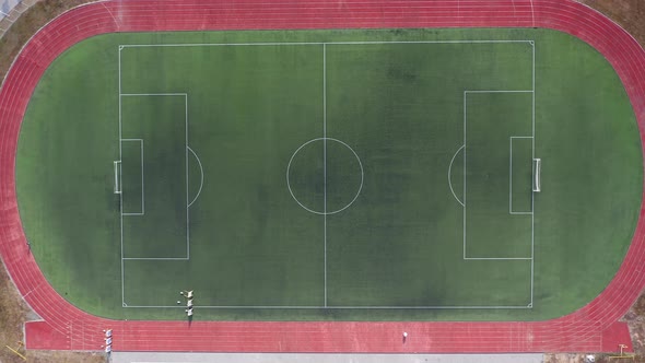 An Open Stadium with Stands for Fans a Football Pitch alt