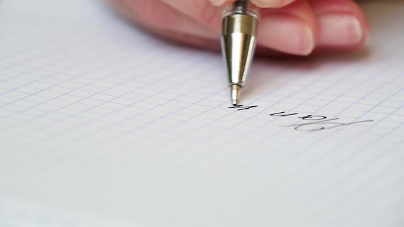 Hand Writing on a Piece of Paper Text, Plan. Business Plan, Daily Planner. Close Up. alt