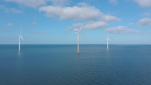 Huge Windmill Turbines Offshore Windmill Farm in the Ocean Westermeerwind Park Windmills Isolated at alt