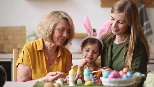 Happy Easter Family Elderly Grandmother and Young Woman Mother Blonde with Little Daughter with alt