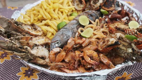 Plate with Seafood Large Served on Deliciously Platter Exotic Lunch in Africa alt