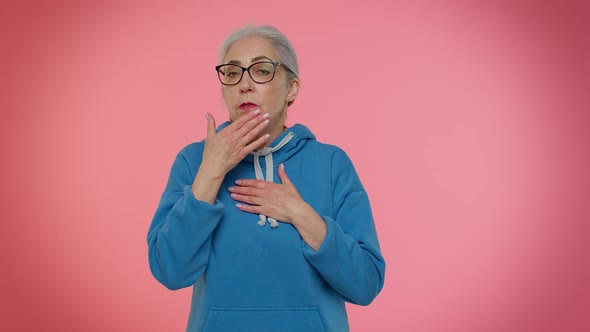 Frightened Elderly Woman Closing Her Mouth with Hand Gestures No Refusing to Tell Terrible Secret alt