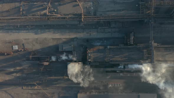 Aerial View. Emission To Atmosphere From Industrial Pipes alt